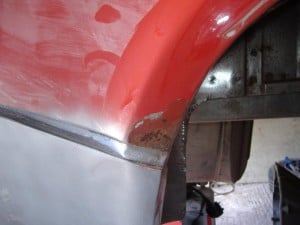 tr7-rear-wheelarch-lip-damage