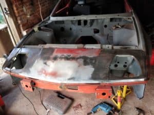 TR7 front panel being prepped