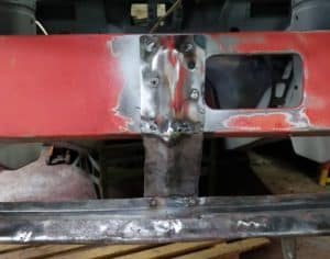 Front spoiler bracket welded in place